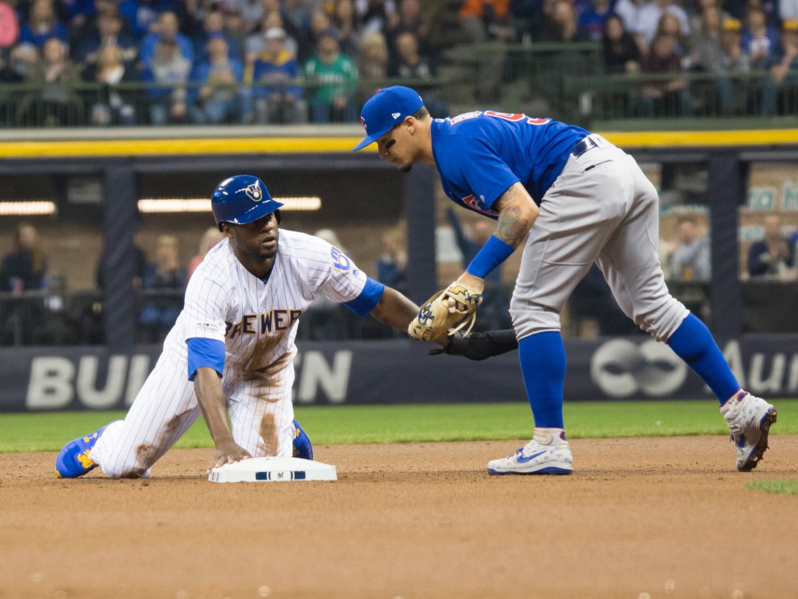 Christian Yelich powers up as Brewers explode to clinch playoff berth 