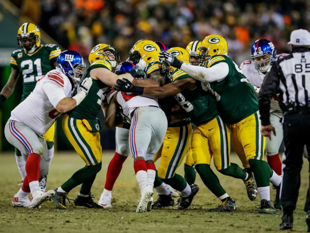 NFL wildcard round: New York Giants 13-38 Green Bay Packers – as