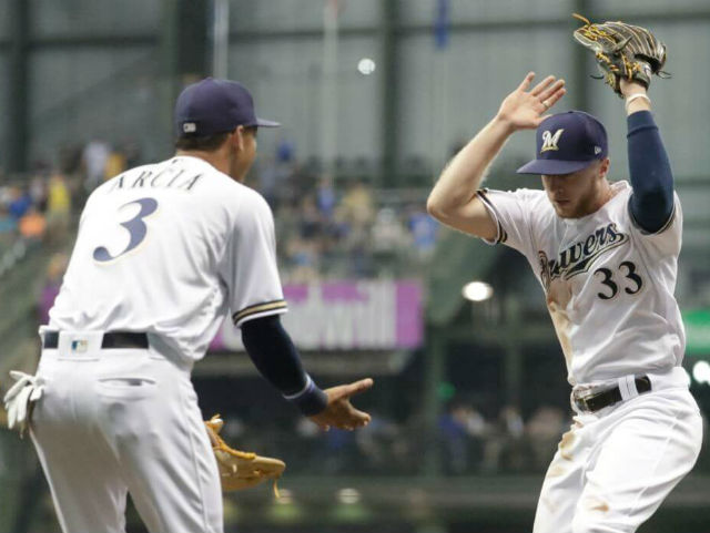 Perfect fit: Brewers players grasping MLB trend of glove customization