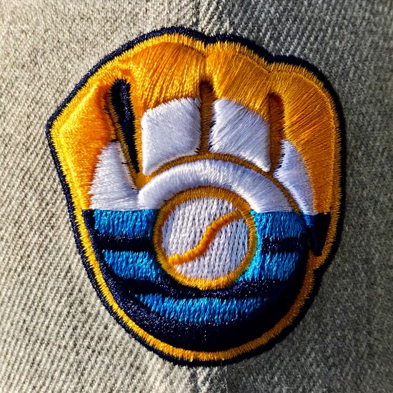 Wear two winning looks in one with these Milwaukee flag Brewers hats
