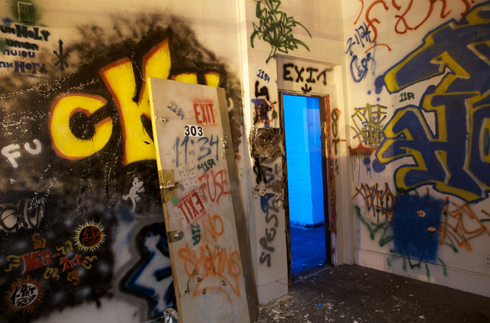 A grafitti-painted doorway.